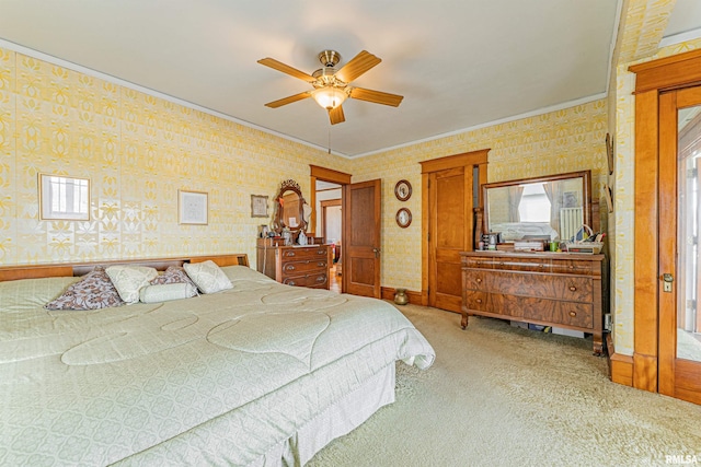 bedroom featuring ornamental molding, light carpet, baseboards, and wallpapered walls