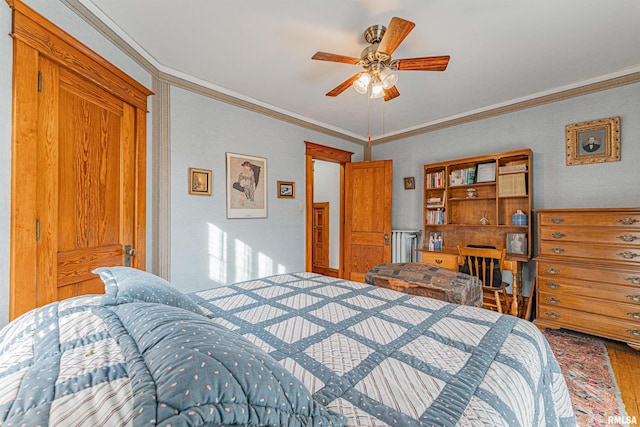 bedroom featuring crown molding and ceiling fan