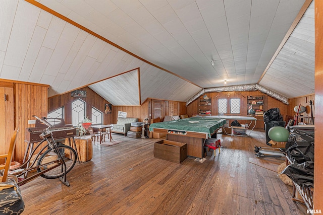 recreation room featuring lofted ceiling, wood-type flooring, pool table, and wooden walls