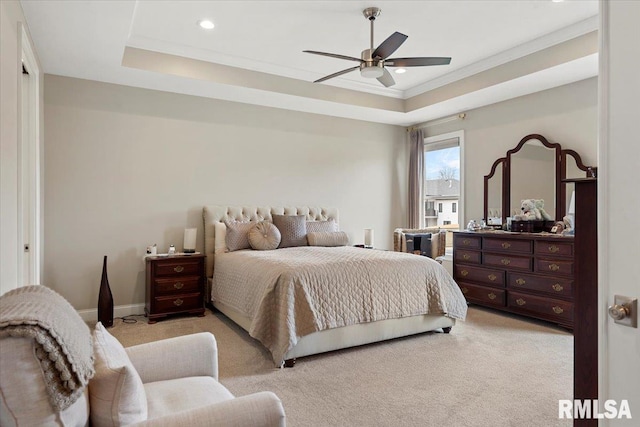 bedroom featuring baseboards, a ceiling fan, light colored carpet, a tray ceiling, and recessed lighting