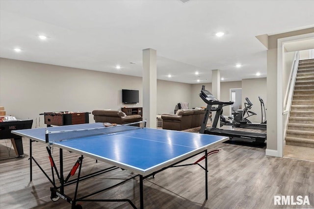 rec room featuring light wood-type flooring and recessed lighting