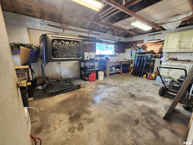 basement with a workshop area