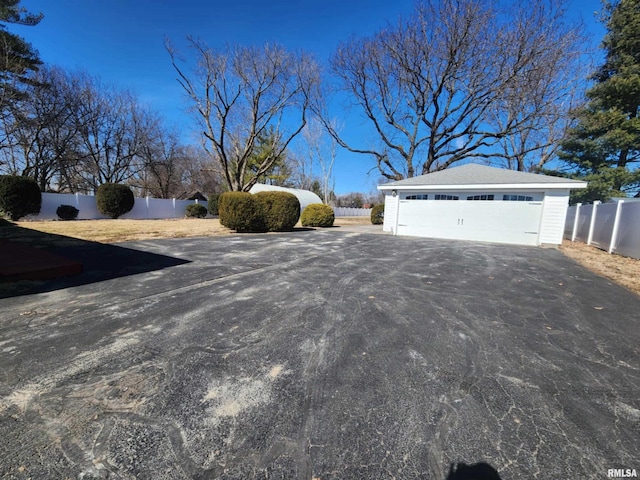 view of street with aphalt driveway