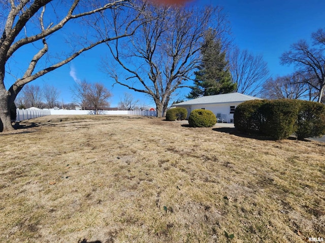 view of yard featuring fence