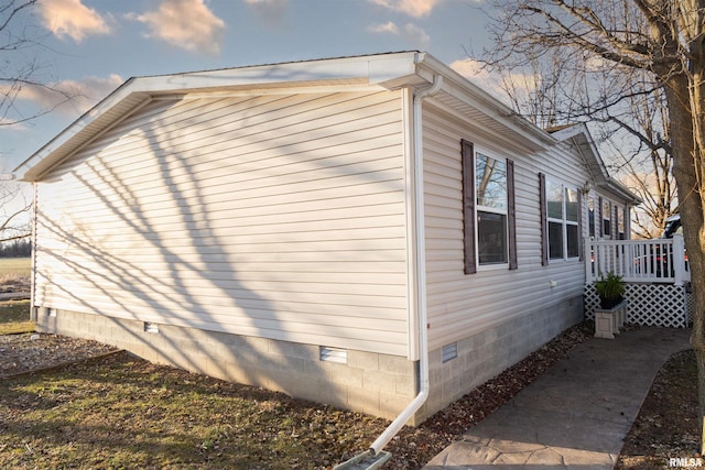 view of home's exterior featuring crawl space