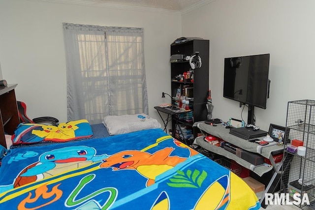 bedroom with ornamental molding