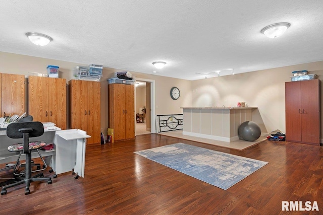 office space featuring a textured ceiling and wood finished floors