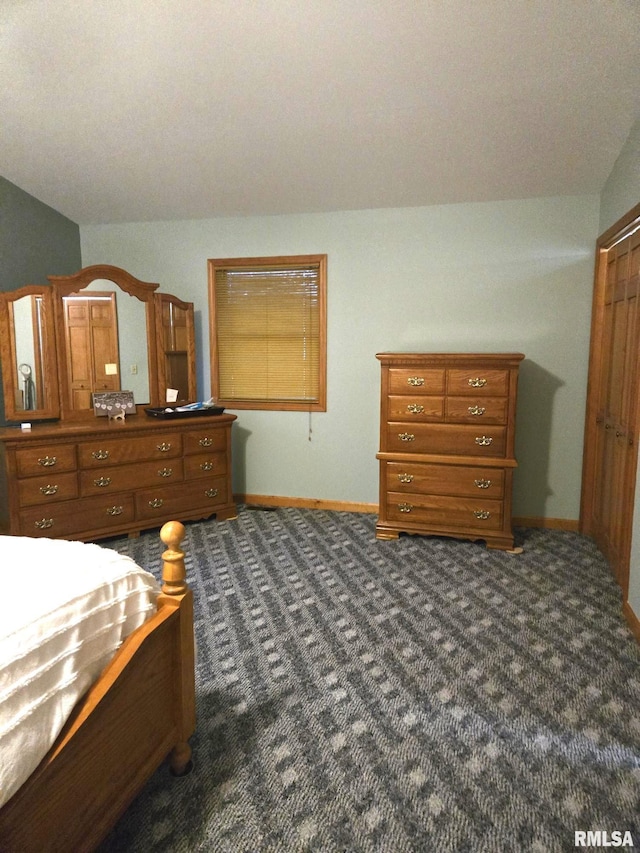 bedroom featuring lofted ceiling, carpet flooring, and baseboards