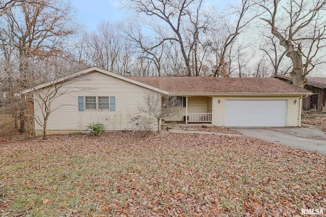 ranch-style house with a garage, concrete driveway, and roof with shingles