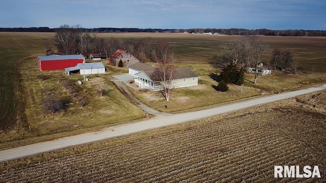 birds eye view of property featuring a rural view