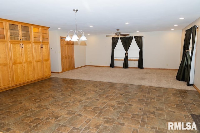 carpeted spare room with recessed lighting, ceiling fan, and baseboards