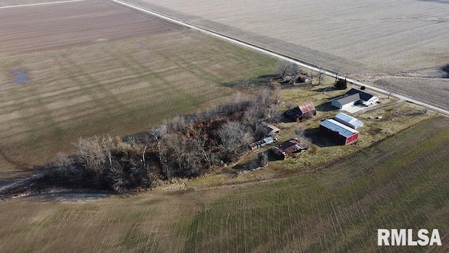 birds eye view of property featuring a rural view