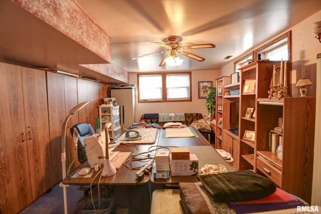 dining space featuring a ceiling fan