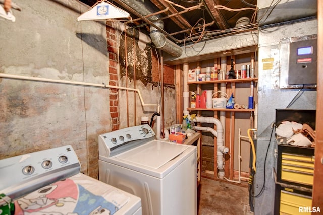 laundry area with laundry area and independent washer and dryer