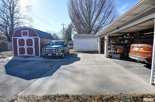 garage featuring a shed