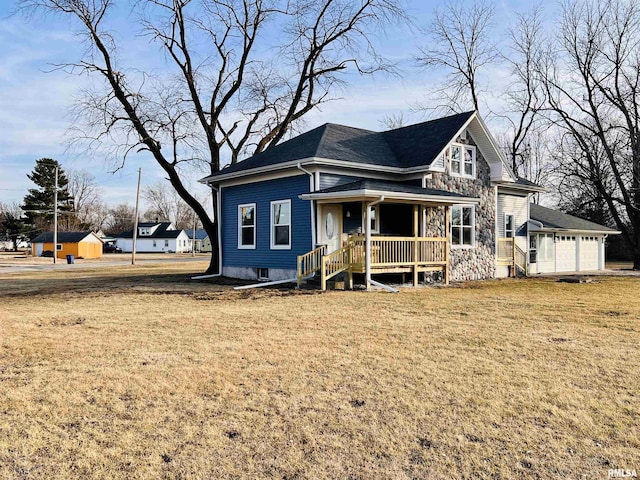 view of front of home featuring covered porch and a front yard