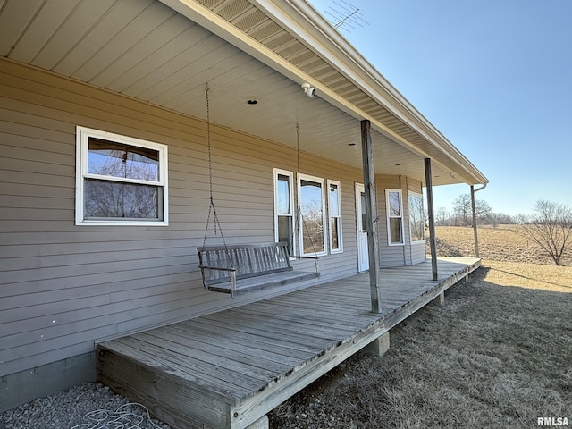 deck with covered porch