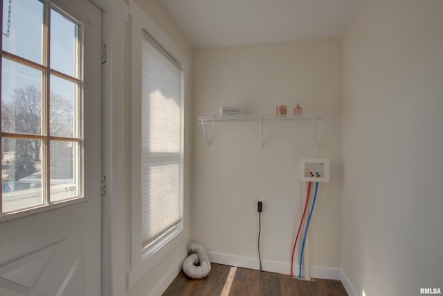 laundry room featuring laundry area, baseboards, dark wood-style floors, and washer hookup