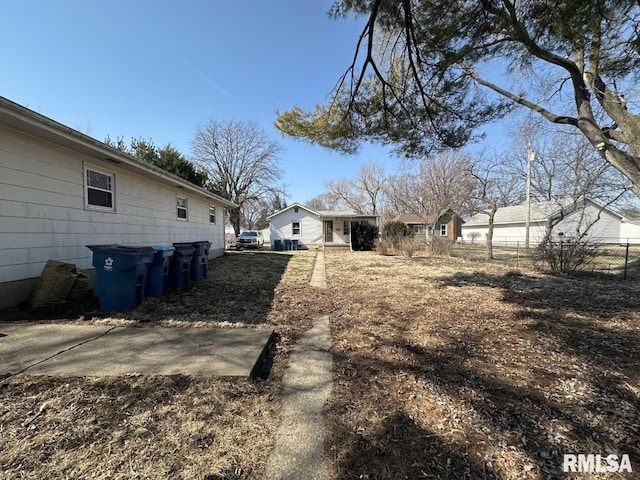 view of yard featuring fence