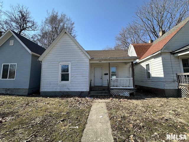 view of front of property featuring covered porch