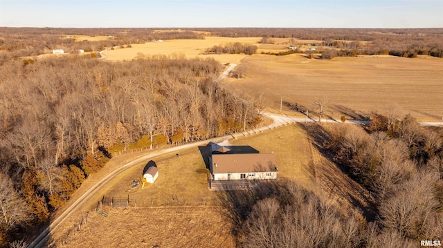 birds eye view of property featuring a rural view
