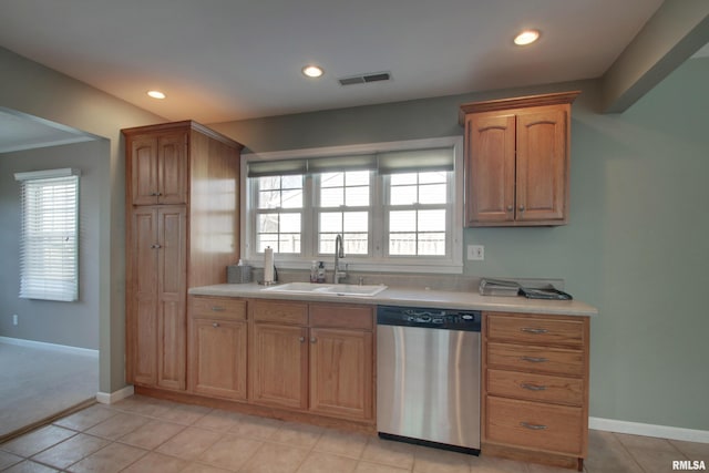 kitchen featuring recessed lighting, light countertops, visible vents, a sink, and dishwasher