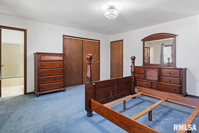 bedroom featuring carpet flooring, connected bathroom, and baseboards