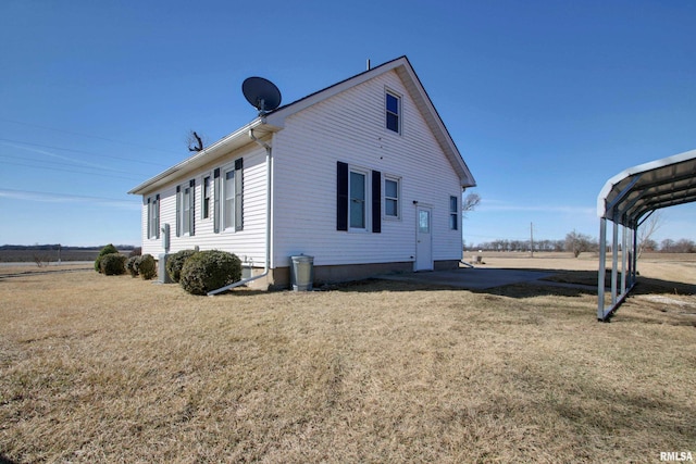 view of property exterior featuring a yard