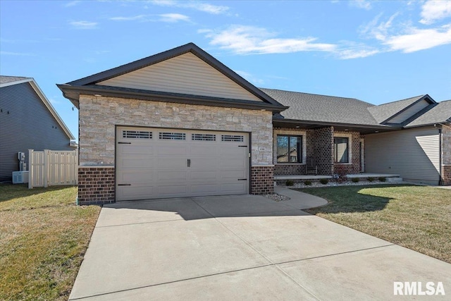 single story home with a front yard, brick siding, an attached garage, and fence