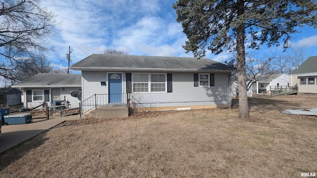 view of front of house with a front yard