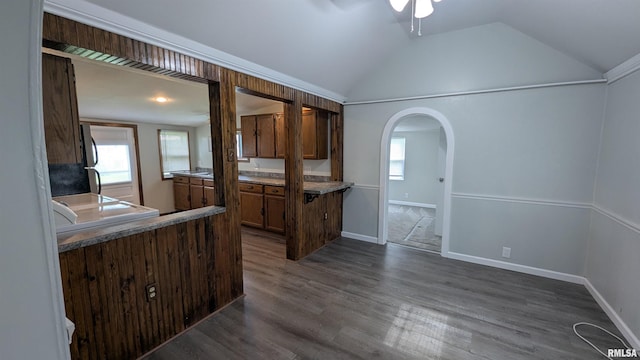 926REAR S 19th St, Quincy, IL 62301 - kitchen with arched walkways, ceiling fan, dark wood finished floors, lofted ceiling, and brown cabinetry