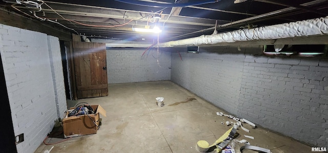 814 W Edwards St, Springfield, IL 62704 - unfinished basement featuring brick wall