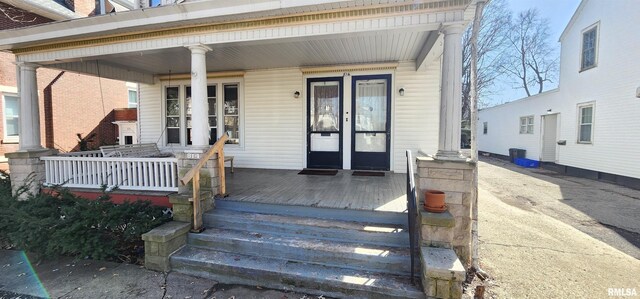 814 W Edwards St, Springfield, IL 62704 - doorway to property featuring covered porch