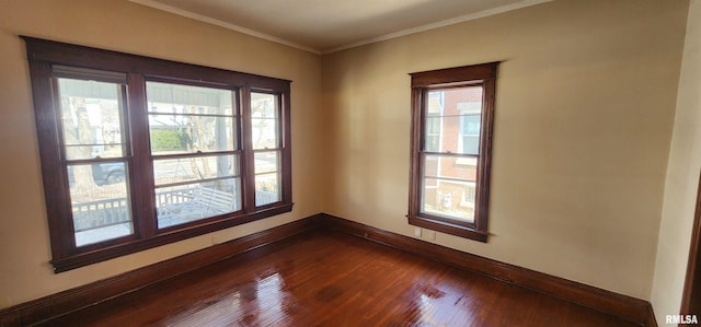 814 W Edwards St, Springfield, IL 62704 - empty room with baseboards, dark wood finished floors, and crown molding