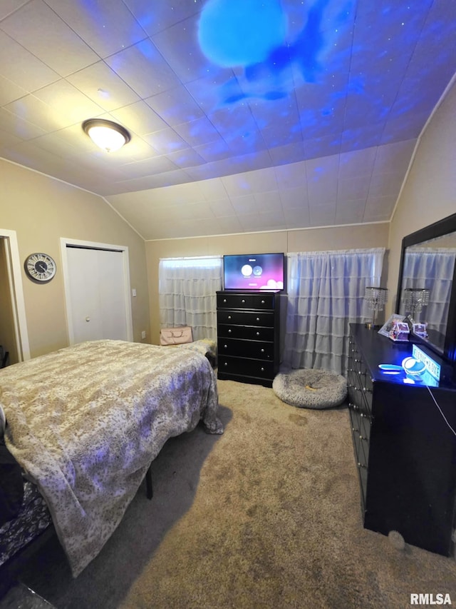 carpeted bedroom featuring vaulted ceiling