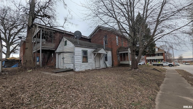 view of property exterior with stairs