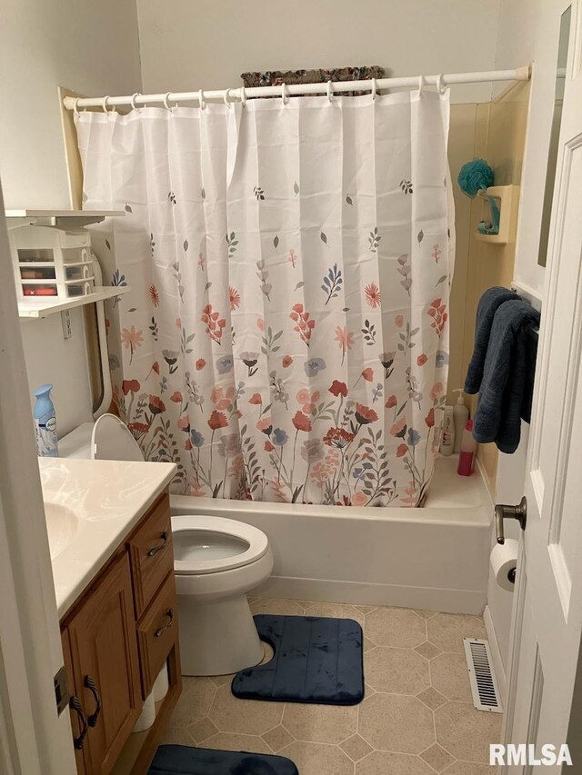 bathroom featuring visible vents, toilet, shower / bathtub combination with curtain, tile patterned flooring, and vanity