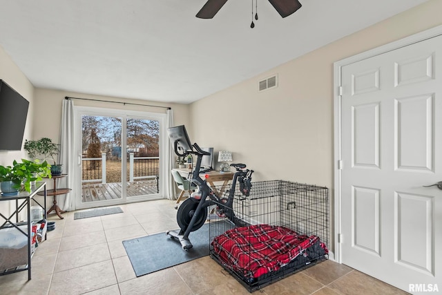 workout room with tile patterned flooring and visible vents