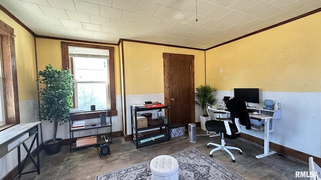 office featuring crown molding, baseboards, and wood finished floors