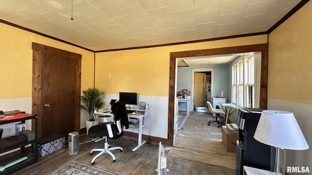 office area with crown molding and wood finished floors