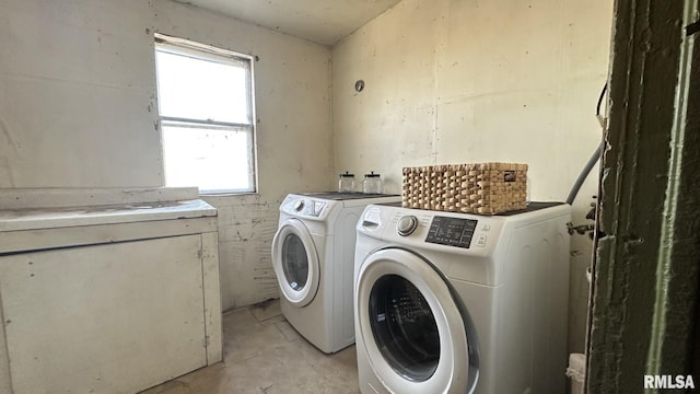 clothes washing area featuring laundry area and independent washer and dryer