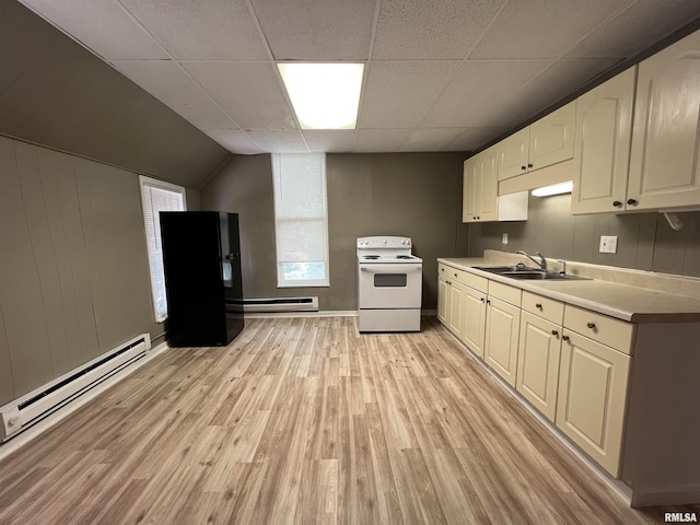 kitchen with a sink, freestanding refrigerator, white range with electric stovetop, light wood-style floors, and baseboard heating