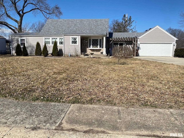 single story home with driveway, a pergola, and a garage