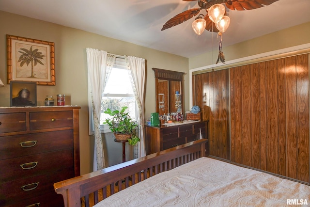 bedroom with a closet and a ceiling fan