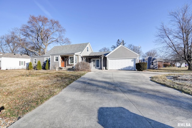 ranch-style house with concrete driveway and a garage