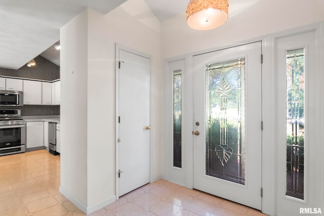 entryway with lofted ceiling