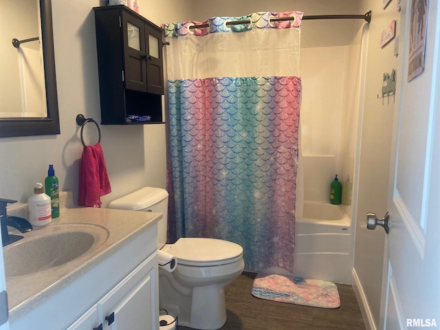 full bath with vanity, shower / bathtub combination with curtain, toilet, and wood finished floors