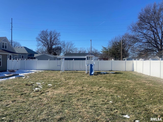 view of yard with a fenced backyard