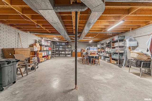 unfinished basement with brick wall