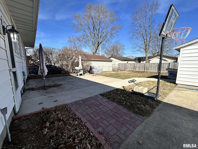 view of yard featuring a patio and a fenced backyard